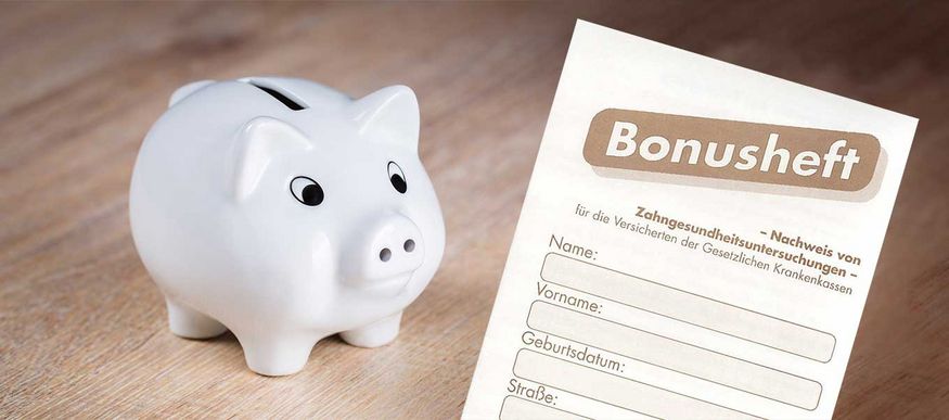 Sparschwein und Bonusheft – Festzuschuss beim Zahnersatz